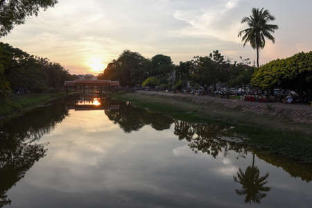Siem Reap, Cambodia - 10 january 2018: river with bridge and night market in Siem Reap, Cambodiaのeditorial素材