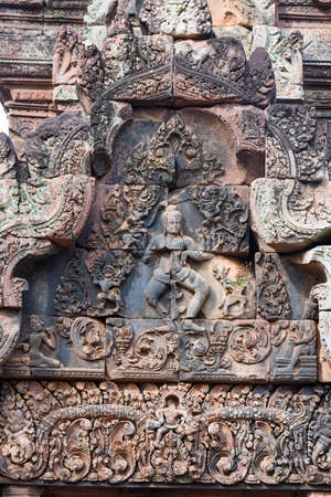 Banteay Srei temple close-up carving, located in the area of Angkor in Cambodiaの写真素材