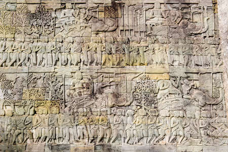 Bas relief sculpture, elephant charging into battle between the Cham and Khmer. Bayon Temple, Angkor Thom, Siem Reap, Cambodiaのeditorial素材