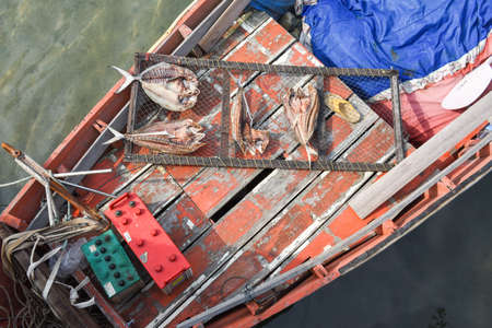 Fish driying on a boat at Ao Yai in Koh Kood island on Thailand