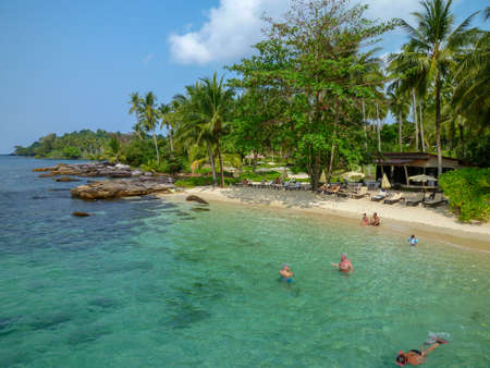 Koh kood island, Thailand - 29 January 2018: people swimming on beautiful tropical beach at Koh Kood island in Thailandのeditorial素材