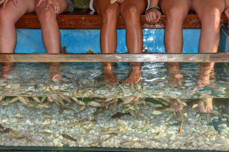 Fish spa feet pedicure skin care treatment at Bangkok on Thailandの写真素材