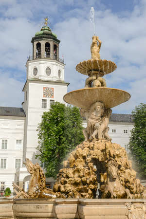 The fountain of Residence square in the old town of Salzburg on Austriaのeditorial素材