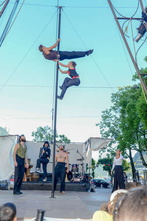 Lugano, Switzerland - 15 July 2016 - Acrobats doing tricks at Buskers Festival in Lugano, Switzerlandのeditorial素材