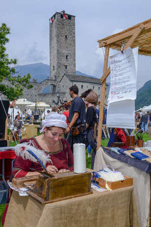 Bellinzona, Switzerland - 27 May 2018: Scribbled woman who is drawing a painting at Castelgrande...