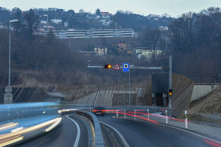 The car light trails in front of a tunnel at Lugano on Switzerland