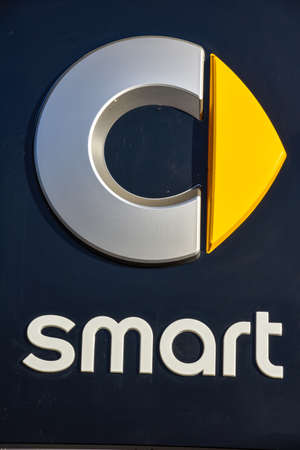 Lugano, Switzerland - 24 October 2018: Logo sign of Smart car dealer at Lugano on Switzerland