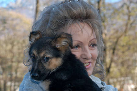 Lugano, Switzerland - 19 November 2002: woman with a dog at the animal shelter of Lugano on Switzerlandのeditorial素材