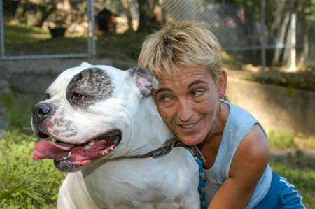 Lugano, Switzerland - 19 November 2002: girl with a dog at the animal shelter of Lugano on Switzerlandのeditorial素材