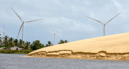 Windmills on the sand dunes of Lencois Maranhenses near Atins on Brazilの写真素材