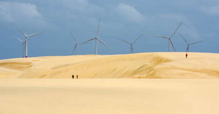 Atins, Brazil - 14 January 2019: Windmills on the sand dunes of Lencois Maranhenses near Atins on Brazilの写真素材