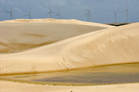 Windmills on the sand dunes of Lencois Maranhenses near Atins on Brazilの写真素材