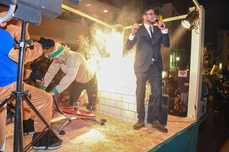 Engelberg, Switzerland - 11 February 2018: Participants in costumes perform a street procession at the carnival of Engelberg on the Swiss alpsのeditorial素材