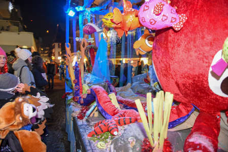 Engelberg, Switzerland - 11 February 2018: Participants in costumes perform a street procession at the carnival of Engelberg on the Swiss alpsのeditorial素材