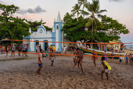 Praia do Forte, Brazil - 31 January 2019: people playing footvolley at Praia do Forte on Brazil