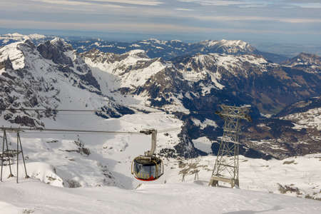 The cableway that leads to the mount Titlis over Engelberg on the Swiss alps