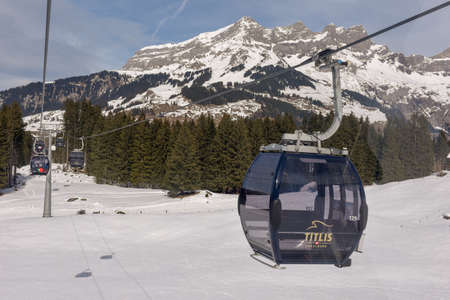 Engelberg, Switzerland - 3 March 2019: cableway to Mount Titlis over Engelberg on the Swiss alpsのeditorial素材