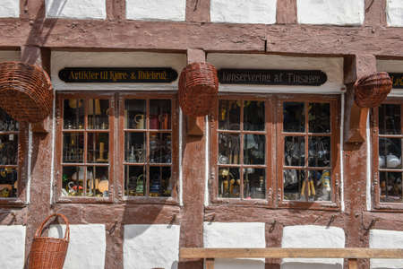 Odense, Denmark - 24 June 2019: window of a traditional historic house at Odense on Denmark