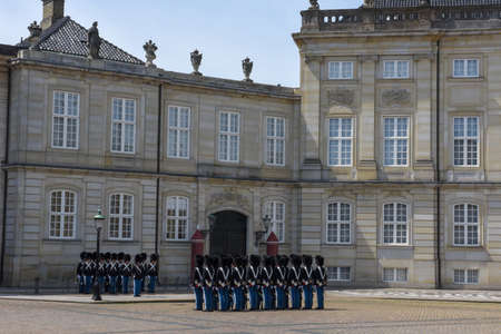 Copenhagen Denmark - 25 June 2019: changing of the guard at Amalienborg palace on town square in...