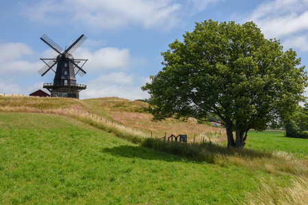 Old wodden windmill at MoÌˆlle on Sweden