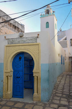 Traditional door of a mosque on the medina at Sousse in Tunisiaの写真素材