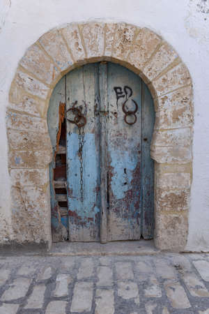 Traditional door of a house on the medina at Sousse in Tunisia