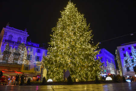 Lugano, Switzerland - 11 December 2019: people shopping on the christmas market in the central square of Lugano, Switzerlandのeditorial素材
