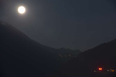 Full moon over mount Bre at Lugano on Switzerlandのeditorial素材