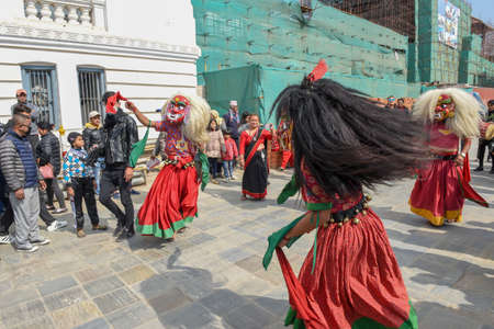 Kathmandu, Nepal - 1 February 2020:  traditional masked dance at Durban square in Kathmandu on Nepal