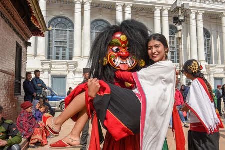Kathmandu, Nepal - 1 February 2020: woman with a traditional mask at Durban square in Kathmandu on Nepalのeditorial素材