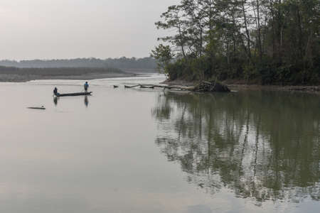 Fisherman at Rapti river of Chitwan national park on Nepal