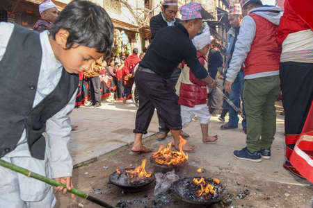 Bhaktapur, Nepal - 27 January 2020: people on a Hindu sacrifice at Bhaktapur in Nepal