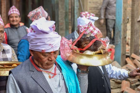 Bhaktapur, Nepal - 27 January 2020: people on a procession for a Hindu sacrifice at Bhaktapur in Nepalのeditorial素材