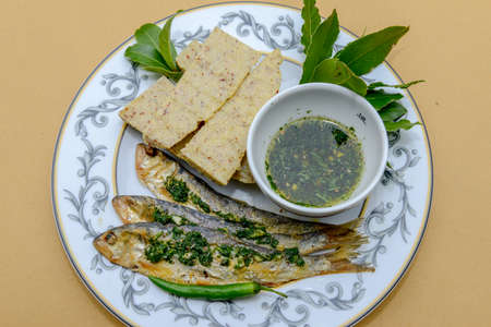 Whitefish in Lemon and Dill sauce with polenta on a restaurant on the italian part of Switzerlandの写真素材