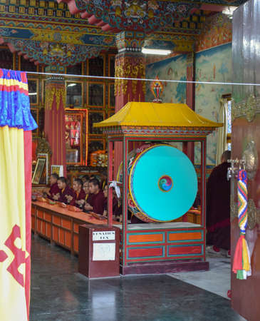 Pokhara, Nepal - 13 January 2020: monks on prayer at the tibetan buddhist monastery of Jangchub Choeling near Pokhara on Nepalのeditorial素材