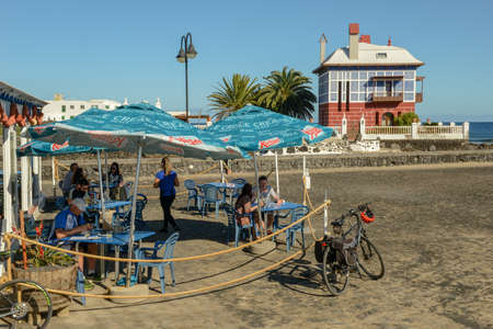 Lanzarote island, Spain - 22 January 2021: people eating in a restaurant of Arrieta on Lanzarote island, Spainのeditorial素材