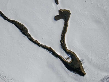 Winter landscape view at a river of Engelberg on the Swiss alps