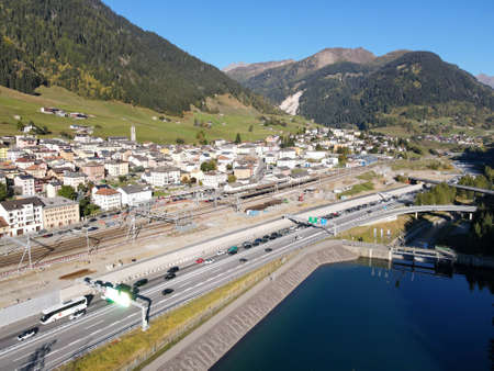Cars in queue waiting to enter the Gotthard motorway tunnel at Airolo on the Swiss alps