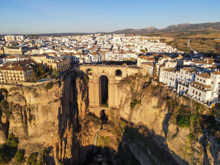 Drone view at the old bridge of Ronda on Andalusia in Spainの写真素材