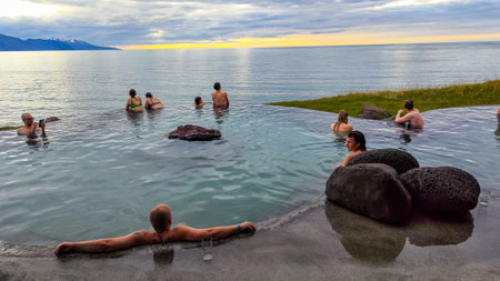 Husavik, Iceland- 13 July 2022: people on the wellness pool at Husavik on Iceland