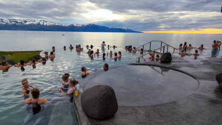 Husavik, Iceland- 13 July 2022: people on the wellness pool at Husavik on Icelandのeditorial素材