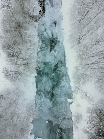 Drone view at frozen landscape at Engelberg on the Swiss alpsの写真素材