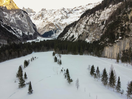 Drone view at frozen landscape at Engelberg on the Swiss alpsの写真素材