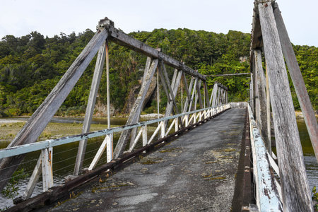 Historic river bridge on the coast of Punakaiki on New Zealandの写真素材