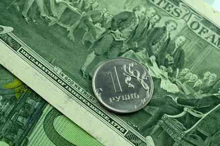 Russian coin of 1 ruble and dollar and euro banknotes, close-up.の写真素材