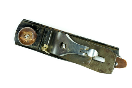Old rusty planer for woodworking. isolated on white. close-up.