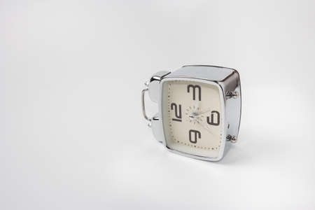 alarm clock on white background conceptの写真素材