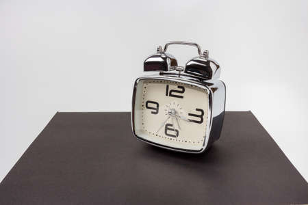 saving money on time and photo on white backgroundの写真素材