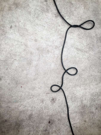 Wire on the cement floor.の素材