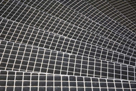 Grid of the stairs in industrial installation. Top viiew in the stairs